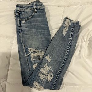 American eagle ripped blue jeans